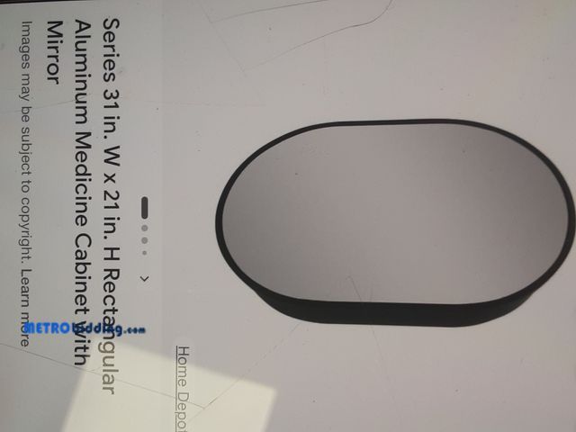 Lot 88-501704 - MOVO oval aluminum medicine cabinet 
31-Iinch x 21-inch
*NOT LIGHTED*