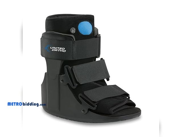 Lot 88-482947 - United Ortho USA14115 Short Air Cam Walker Fracture Boot, Medium, Black, slightly used