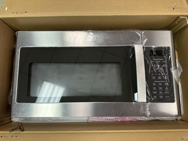 Lot 91-10447 - GE JVM7195SKSS Microwave Oven MSRP $ 569.99 GE® 1.9 Cu. Ft. Over-the-Range Sensor Microwave Oven - N...