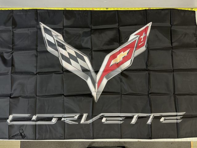 Lot 91-8509 - CORVETTE FLAG 35" X 60" NEW IN PACKAGE