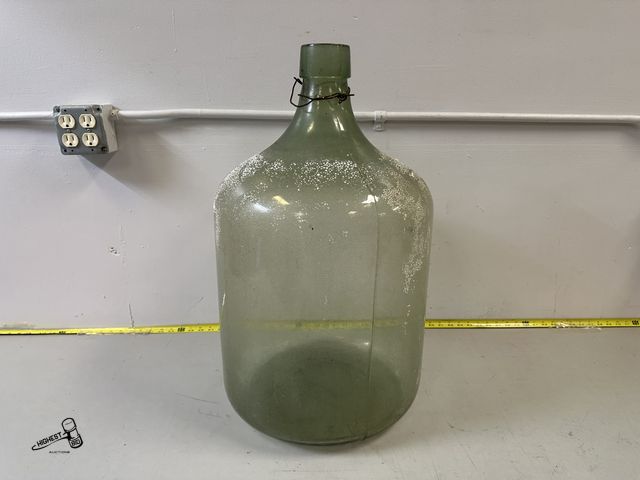 Lot 91-10307 - VINTAGE 1943 LARGE GREEN GLASS JUG FOR WINE MAKING  - 13 GALLON - 15' WIDE X 26.5 TALL - M.C.A.G. ST...