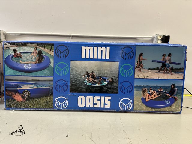 Lot 91-6230 - HO SPORTS MINI OASIS 8' INFLATABLE WATER RING FLOAT - 8' DIAMETER WITH 6' MESH CENTER FOR RELAXING -...