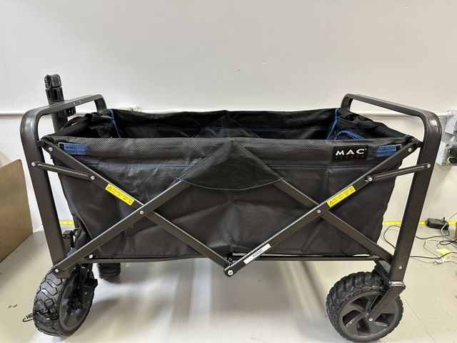 Lot 91-7378 - MAC SPORTS FOLDABLE WAGON WITH BRAKES DOES HAVE A BROKEN HANDLE STILL ROLLS AROUND AS SHOULD