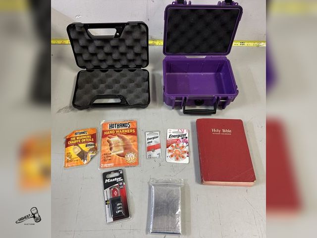 Lot 91-9656 - 2 PISTOL CASES, HOLY BIBLE. PONCHO, MASTER LOCK, HAND &amp; FOOT WARMERS, AND ENERGIZER BATTERIES