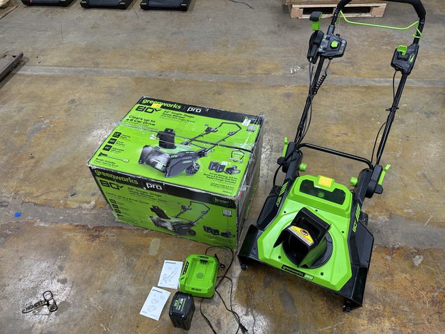 Lot 91-7485 - GREENWORKS 2615002 Single Stage GREENWORKS PRO 22" SINGLE STAGE SNOW BLOWER COMES WITH 1 BATTERY AND...