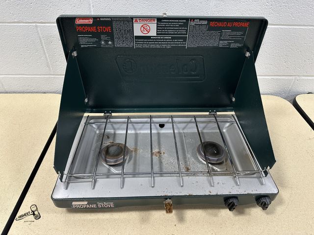 Lot 91-10340 - COLEMAN 2 BURNER PROPANE STOVE WITH TANK HOOK UP
