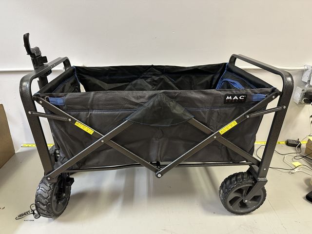 Lot 91-7379 - MAC SPORTS FOLDABLE WAGON DOES HAVE A BROKEN HANDLE STILL ROLLS AS IT SHOULD