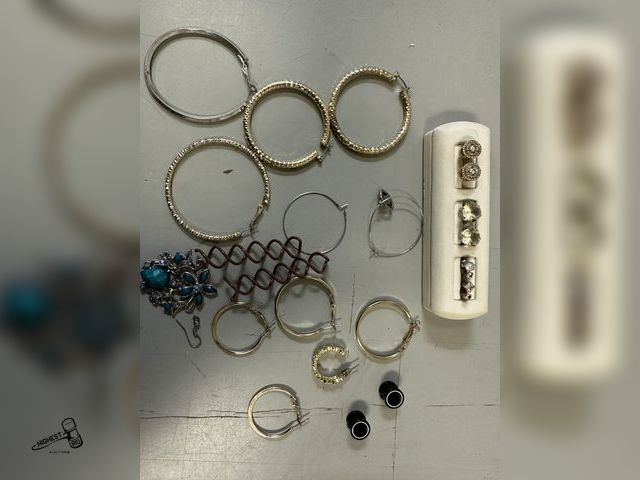 Lot 91-7812 - LOT OF EAR RING RELATED ITEMS
