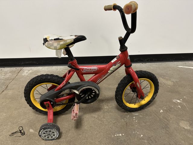 Lot 91-7890 - HUFFY MCQUEEN KIDS BIKE WITH TRAINING WHEELS