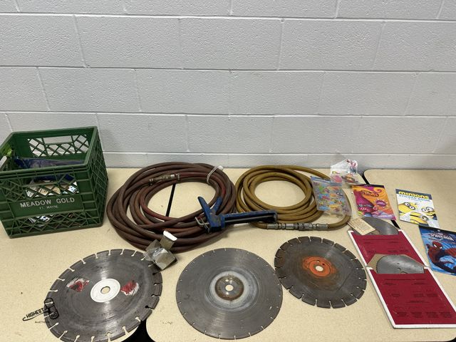 Lot 91-9445 - MISC LOT SAW BLADES , AIR HOSE, CAULK GUN, GAUGE &amp; MORE