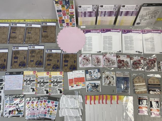 Lot 91-8366 - New TABLE FULL OF SCRAP BOOK SUPPLIES, STICKERS, STAMPS &amp; MORE - RIBBON - DIES - PAPER DIE CUT E...