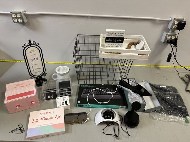 Lot 91-6401 - METAL WIRE BASKET WITH MANY GOOD ITEMS - SIGN FOR HOME - WIRELESS KEYBOARD - JUICER - NAIL KIT - NAI...