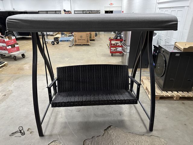 Lot 91-6516 - AGIO MCKINNON WOVEN PATIO SWING - ASSEMBLED - ALUMINUM AND STEEL CONSTRUCTION - DURABLE POWDER COATE...