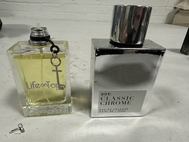 Lot 91-7684 - CLASSIC CHROME 003 3.4 OZ BOTTLE &amp; LIFE ON TOP 2.5 OZ BOTTLE BOTH BOTTLES NEAR FULL