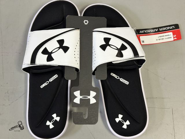 Lot 91-9660 - New WHITE UNDER ARMOUR 4D FOAM SLIDES SIZE 12