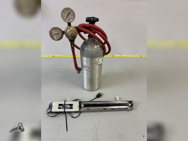 Lot 91-7085 - CARBON DIOXIDE TANK WITH GUAGES AND HOSE AND A BLACKLIGHT