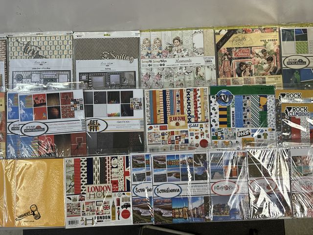 Lot 91-8396 - New 25 NEW PACKS OF 12" X 12" SCRAPBOOK PAGE KITS &amp; STICKERS - MANY DESIGNS