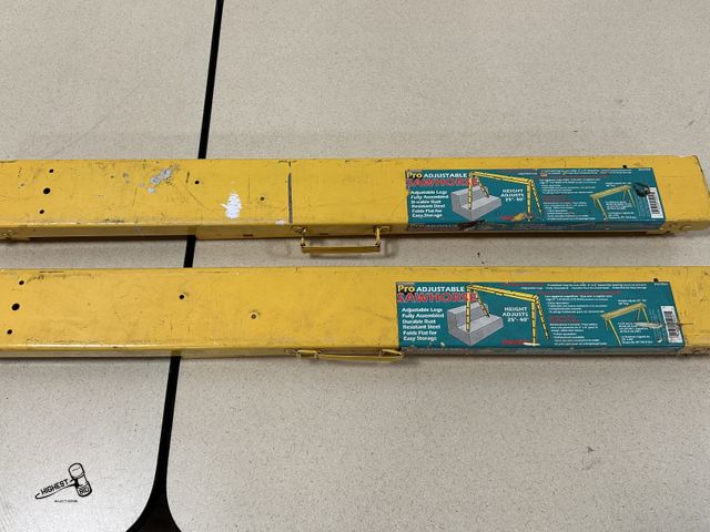 Lot 91-7050 - 2 PRO ADJUSTABLE METAL SAW HORSES