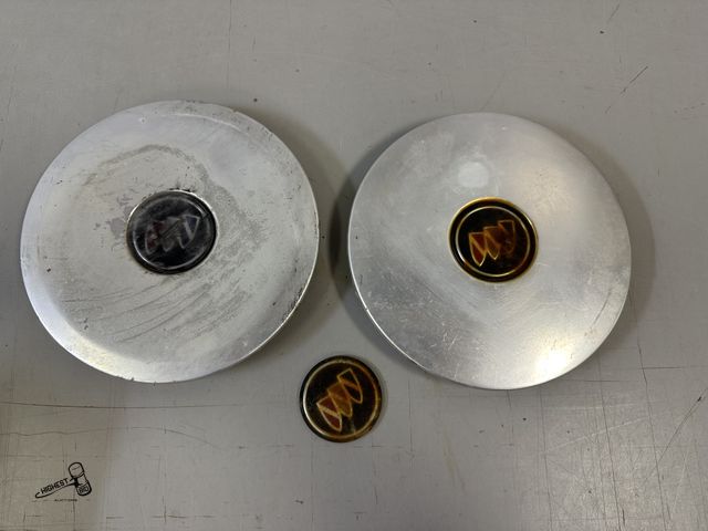Lot 91-6926 - 2 BUICK REATTA WHEEL CENTER CAPS - LIKELY FROM THE 1988-1991 MODEL YEARS