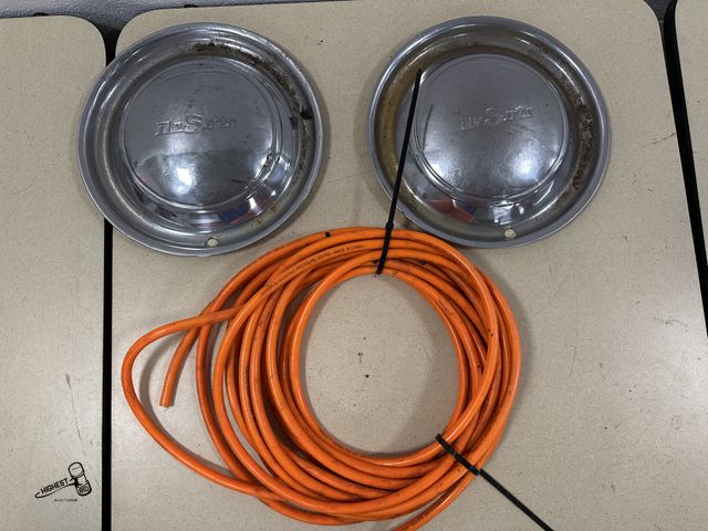 Lot 91-10319 - 2 VINTAGE DESOTO 15 INCH CHROME HUBCAPS AND AIR HOSE