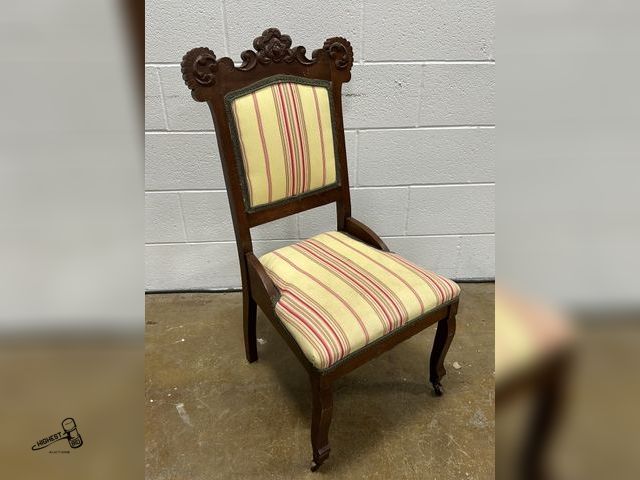 Lot 91-9035 - VINTAGE WOODEN PADDED CHAIR WITH WOODEN WHEEL CASTERS ON FRONT LEGS