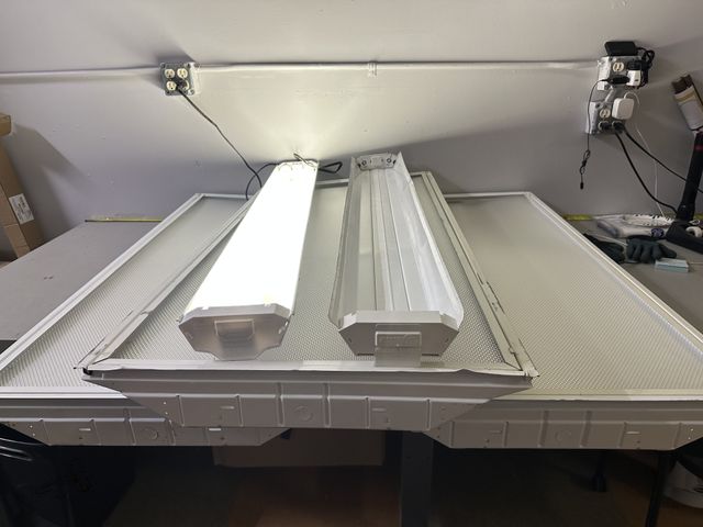 Lot 91-9335 - 3 - 2' X 4' LIGHT FIXTURES HAS TO BE HARD WIRED TO TEST AND 2 HANGING 2 BULB LIGHT FIXTURES ONLY ONE...