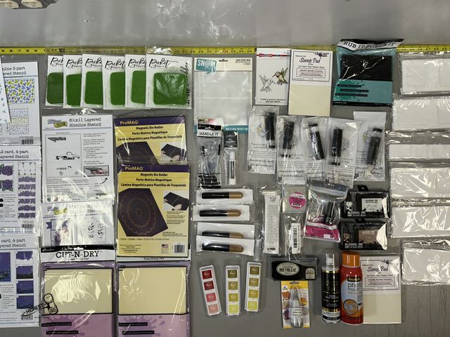Lot 91-8388 - New TABLE FULL OF CRAFTING &amp; SCRAPBOOK SUPPLIES - INKPAD HOLDERS - ALCOHOL INK - STAMP PADS - ST...
