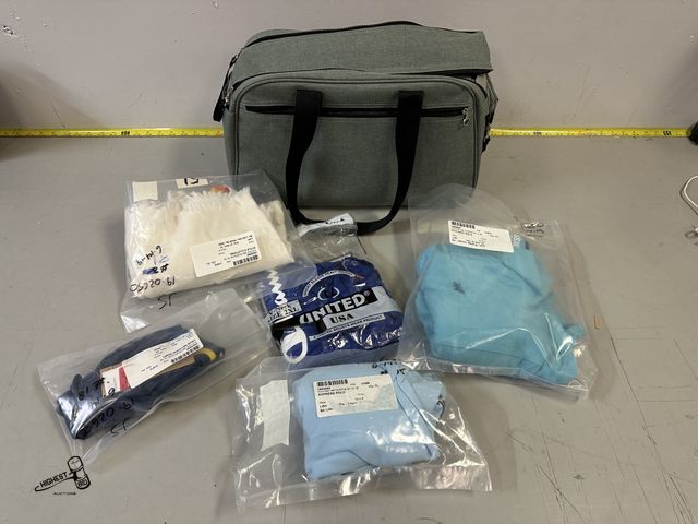 Lot 91-7401 - SCUDDLES DIAPER BAG WITH LAY DOWN MAT - WITH ASSORTED CLOTHING