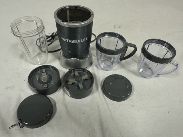 Lot 91-7590 - NUTRI BULLET - MAGIC BULLET WITH 2 SET OF GLASSES &amp; 2 MIXERS WITH LIDS