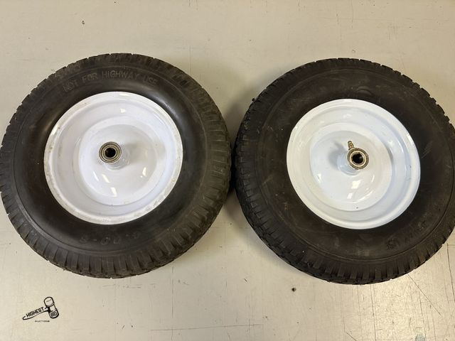 Lot 91-10265 - 2   -   4.00 - 8 SOLID RUBBER TIRES WITH BEARINGS 5/8" DIAMETER SHAFT SIZE
