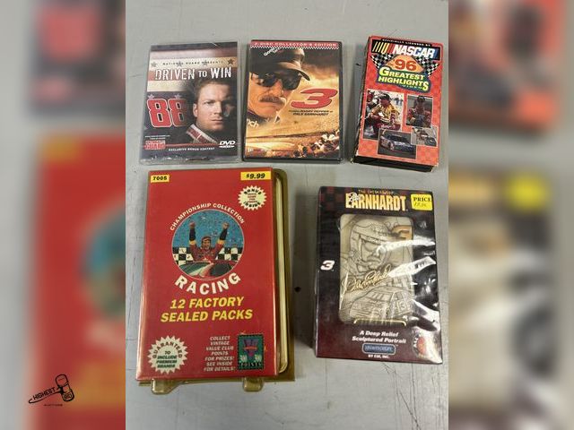 Lot 91-8082 - NASCAR TRADING CARDS 12 FACTORY SEALED PACKS &amp; SEALED IN PLASTIC DALE EARNHARDT SCULPTURED PORTR...