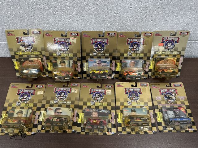Lot 91-6608 - 10 TOTAL NASCAR LEGENDS 50TH ANNIVERSARY 1:64 SCALE DIE CAST REPLICA WITH COLLECTOR CARD AND DISPLAY...