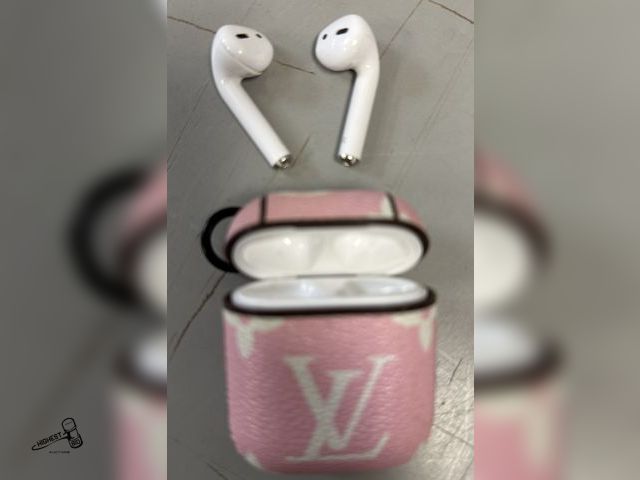 Lot 91-7787 - APPLE AIR PODS IN LV CASE
