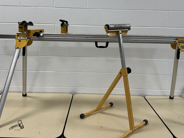Lot 91-7125 - DEWALT DWX723 MITER SAW STAND WITH AN ADJUSTABLE ROLLER STAND - LIGHTWEIGHT ALUMINUM CONSTRUCTION AL...