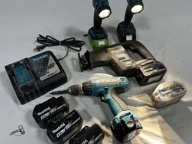 Lot 91-7706 - MAKITA TOOLS - INCLUDES - CHARGER - SEVEN 18 VOLT BATTERYS - DRILL/DRIVER - XRJ07 RECIPROCATING SAW ...