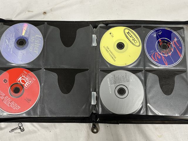 Lot 91-7679 - 83 ASSORTED CD/DVDS IN CASE