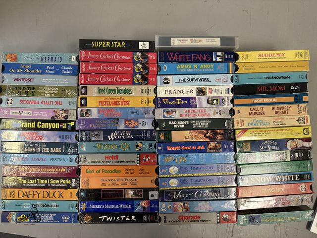 Lot 91-7992 - 61 VHS MOVIES IN CASES SOME NEW SEALED