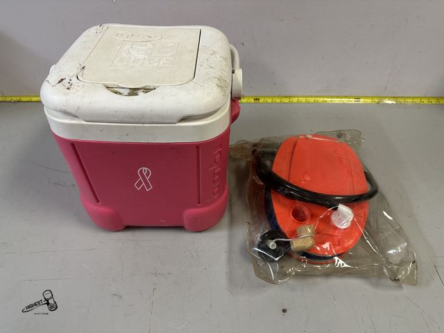 Lot 91-9789 - BREAST CANCER AWARENESS PINK IGLOO ICE CUBE  COOLER AND FOOT  AIR PUMP