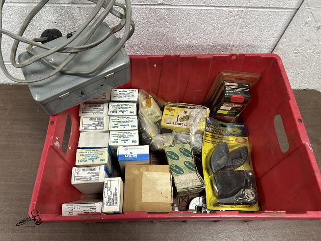 Lot 91-9444 - TOTE FULL OF MISC PARTS - SEVERAL GROUND FAULT OUTLETS, COVERS, RACHET STRAP &amp; MORE
