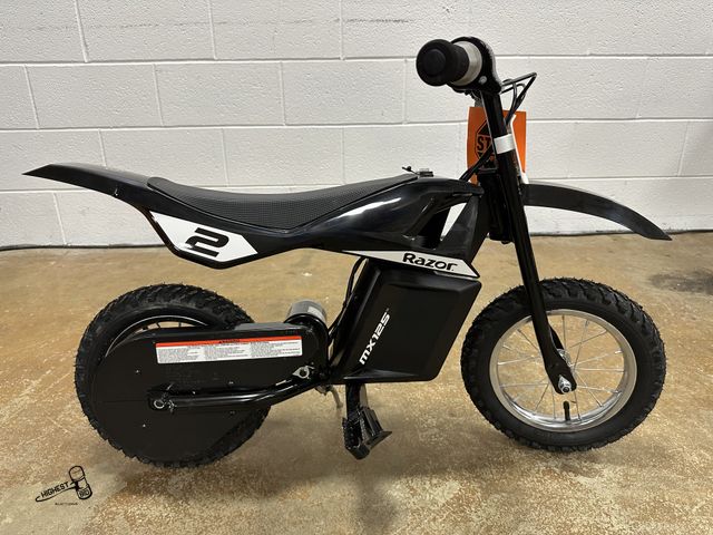 Lot 91-9769 - New MSRP $259.99 NEW ASSEMBLED WITH BOX Razor Dirt Rocket MX125 Electric-Powered Dirt Bike - Black w...