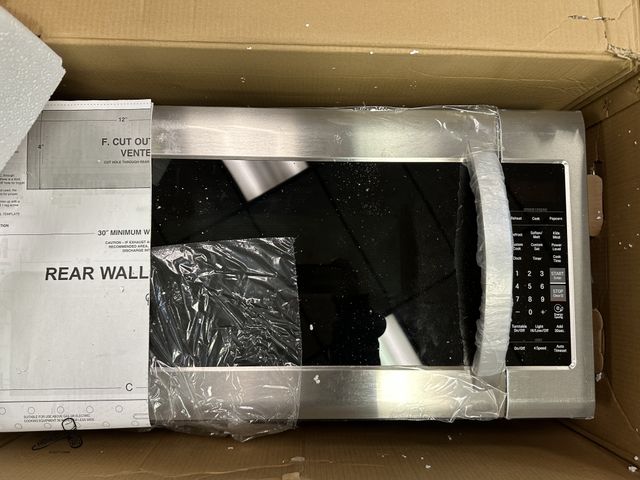 Lot 91-8562 - New LG LMV2031ST Microwave Oven 2.0 cu. ft. Over-the-Range Microwave Oven with EasyClean - QUEIT POW...