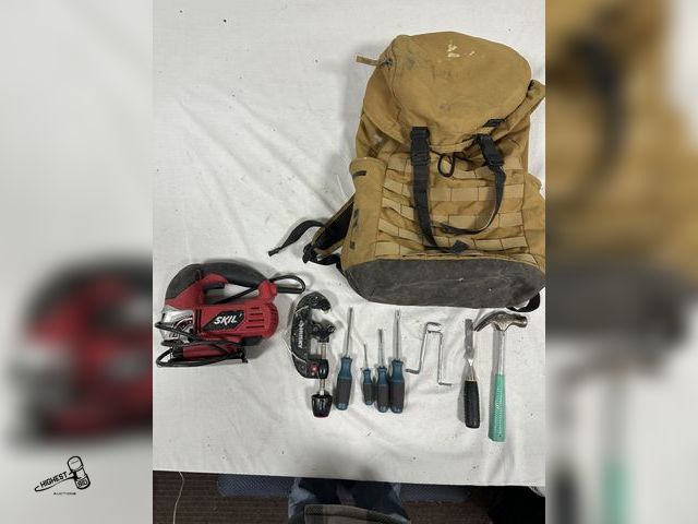 Lot 91-7662 - SKIL JIG SAW &amp; NIKE AIR FORCE-1 WINTERIZED BACK PACK BAG WITH MISC TOOLS