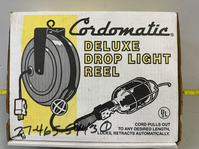 Lot 91-6388 - CORDOMATIC DELUXE DROP LIGHT REEL - CORD PULLS OUT TO ANY DESIRED LENGTH, LOCKS, RETRACTS AUTOMATICA...