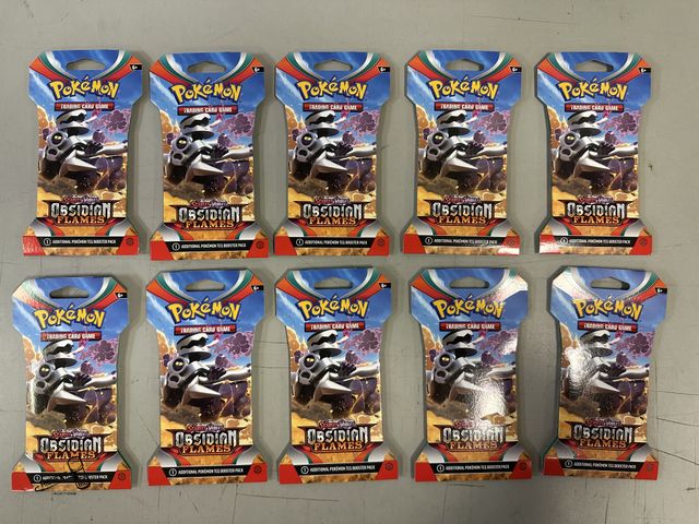 Lot 91-9584 - New IN PACKAGE 10PCK POKEMON SCARLET &amp; VIOLET OBSIDIAN FLAMES 2023
