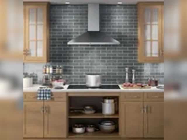 Lot 91-8956 - New MSRP$ 649.99 GE Wall-Mount Pyramid Chimney Range Hood with Dual Halogen Cooktop Lighting - 2-yea...