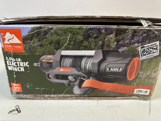 Lot 91-9535 - MSRP $ 235.00 OZARK TRAIL 5,500-LB ELECTRIC WINCH - 3 STAGE PLANETARY GEAR SYSTEM - AUTO-LOAD HOLDIN...