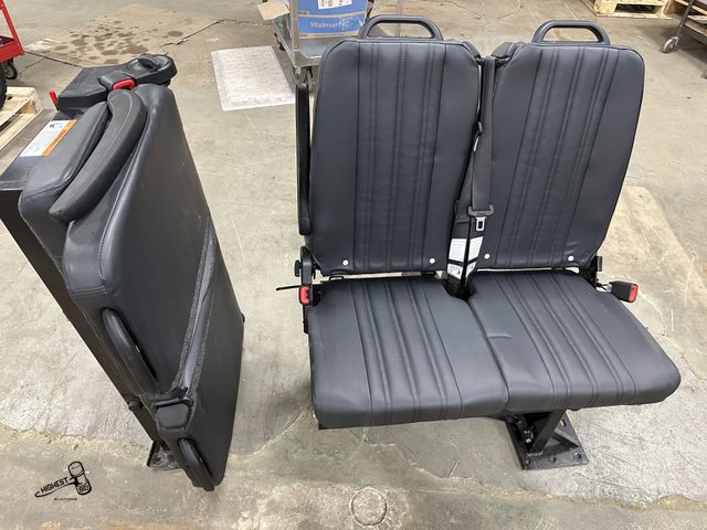 Lot 91-7497 - 2 LEATHER FREEDMAN FOLD DOWN BENCHES WITH SHOULDER BELT SEAT BELTS AND BUCKLES - COULD BE USED FOR M...