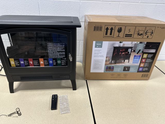 Lot 91-7012 - INFRARED ELECTRIC FIREPLACE STOVE HEATER - 1,500 WATTS - 5,200 BTU - PLUGS INTO STANDARD 120V / 60Hz...