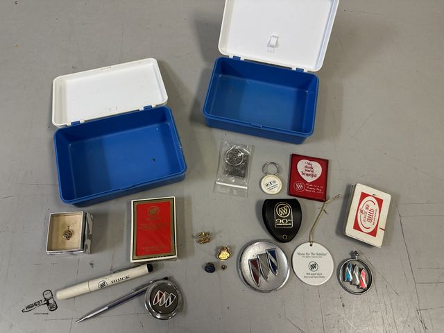 Lot 91-6440 - 2 SMALL BOXES WITH MISC BUICK ITEMS - PLAYING CARDS, PEN, PINS, KEYCHAINS, AND MORE