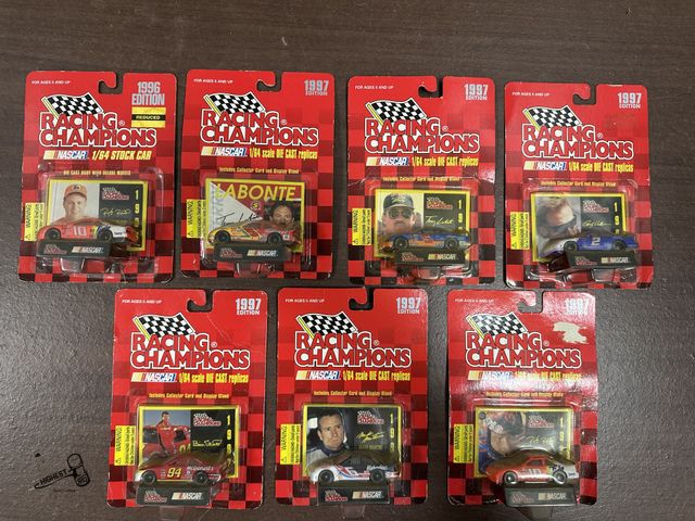 Lot 91-6605 - 7 NASCAR RACING CHAMPIONS 1/64 SCALE DIE CAST REPLICAS - 6 ARE 1997 AND 1 IS 1996 - TERRY LABONTE, R...